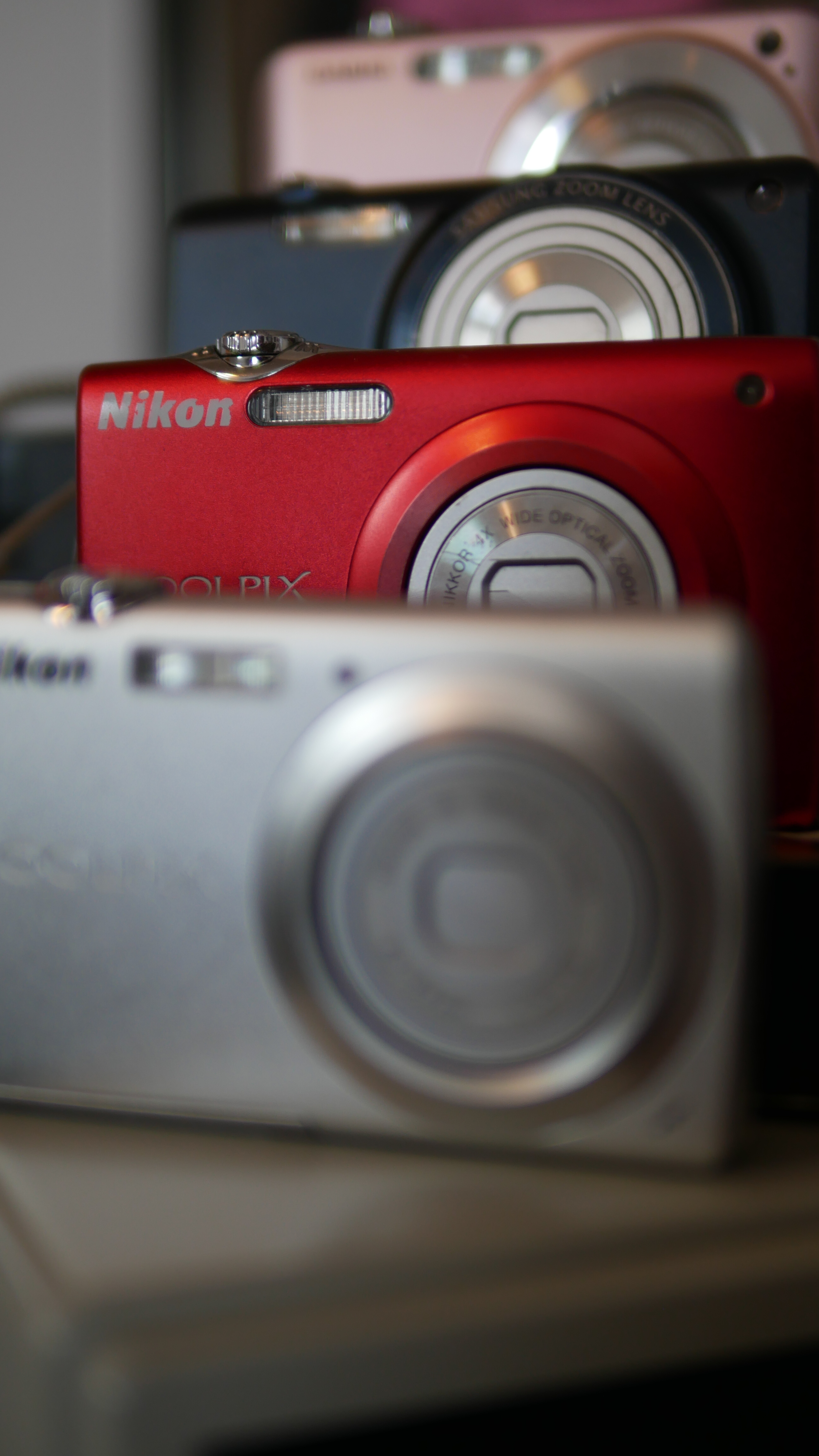 Row of Nikon Coolpix digital cameras